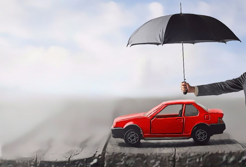 Insurance umbrella over car